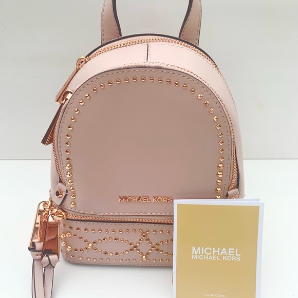 Michael Kors Handbags - Michael Kors Rhea Mini Backpack